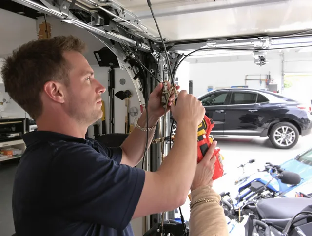 Huntington Park Garage Door Repair safety certified technician performing cable replacement in Huntington Park