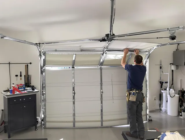 Huntington Park Garage Door Repair specialist performing precise section replacement on Huntington Park garage door